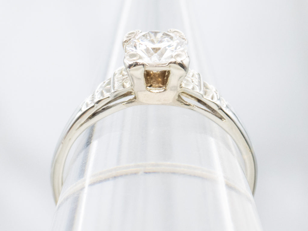 Circa 1930s Diamond Solitaire Engagement Ring with Forget-Me-Not Details