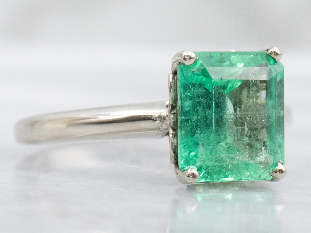 White Gold Emerald Solitaire Engagement Ring