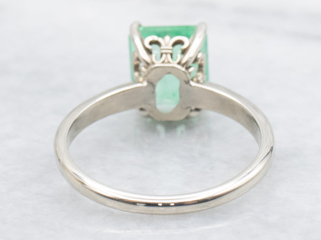 White Gold Emerald Solitaire Engagement Ring