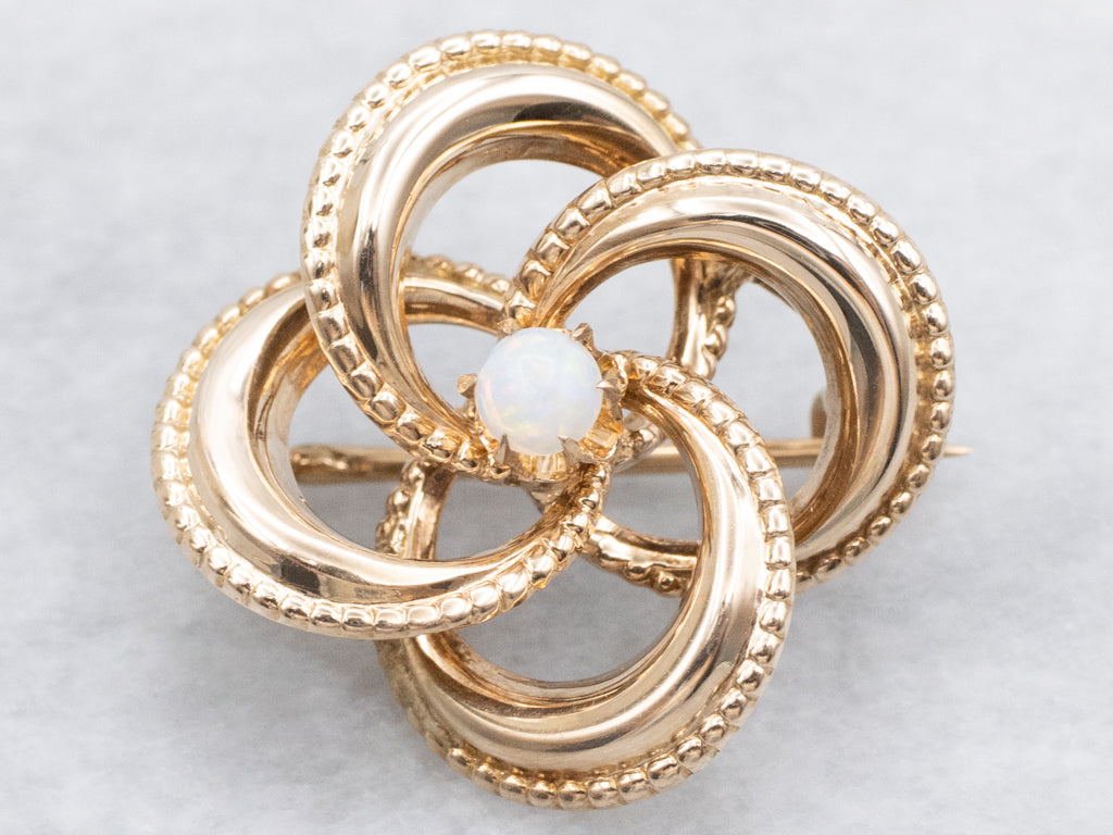 Antique Gold Lover's Knot Brooch with Opal Center