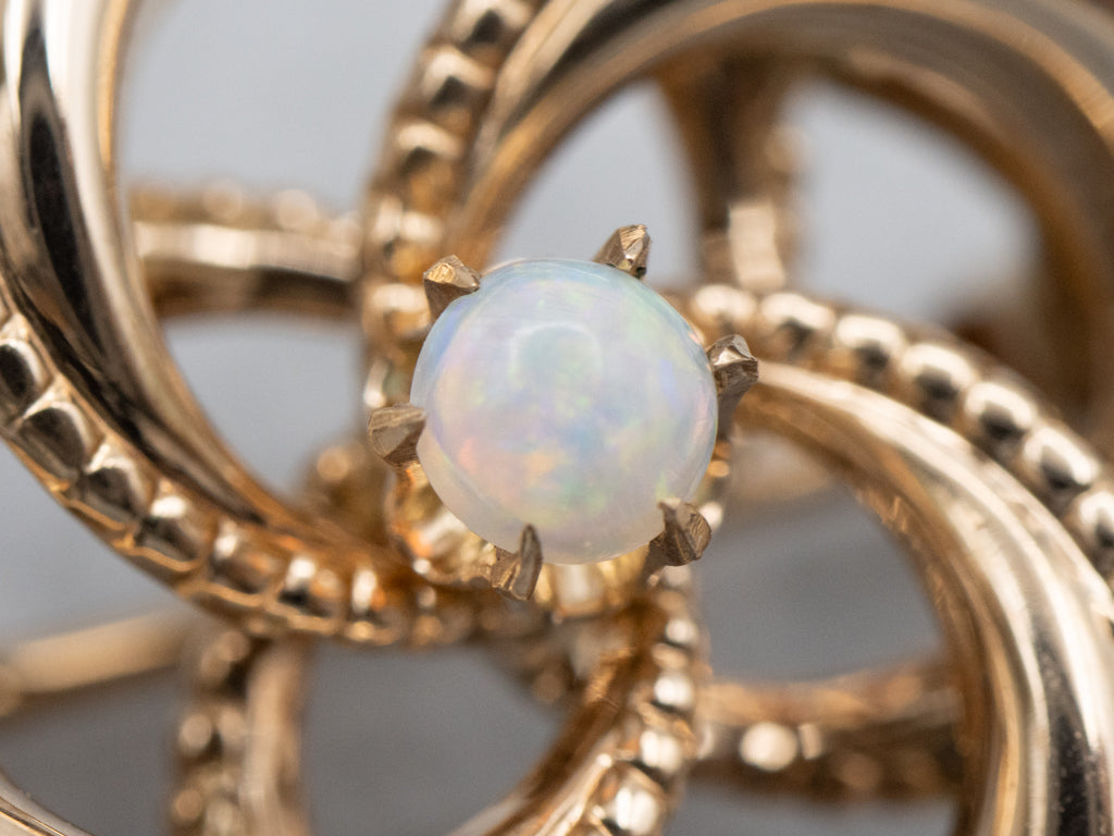 Antique Gold Lover's Knot Brooch with Opal Center