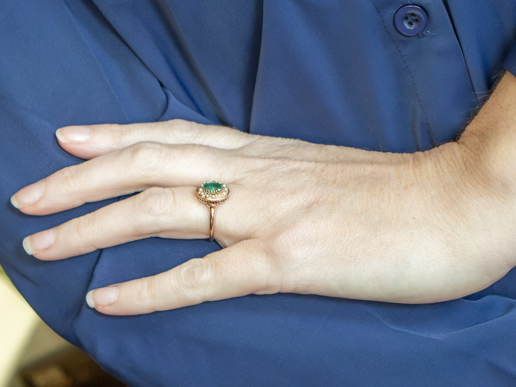 Antique Emerald and Seed Pearl Halo Gold Ring