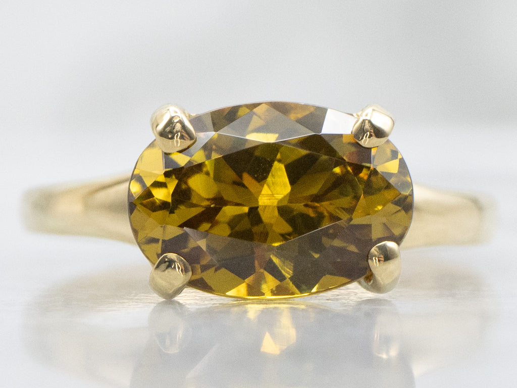 East-to-West Mali Set Mali Garnet and Gold Solitaire Ring