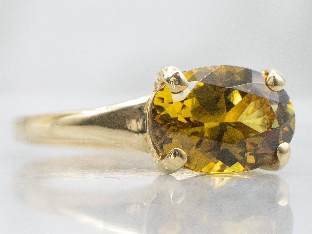 East-to-West Mali Set Mali Garnet and Gold Solitaire Ring