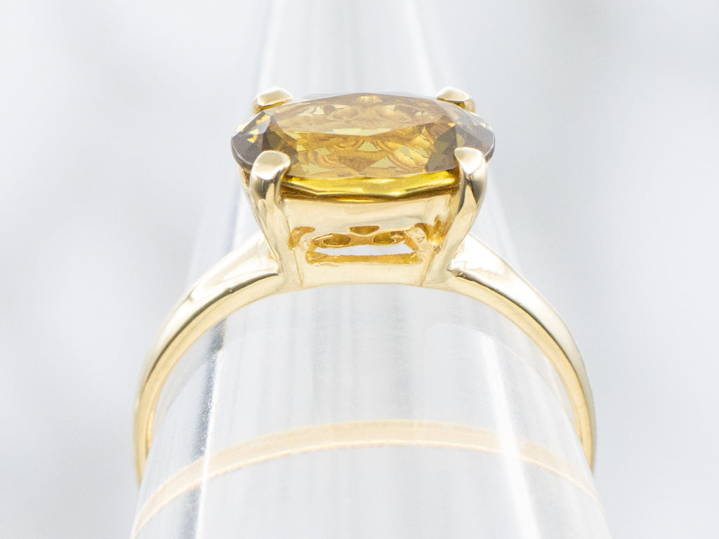 East-to-West Mali Set Mali Garnet and Gold Solitaire Ring
