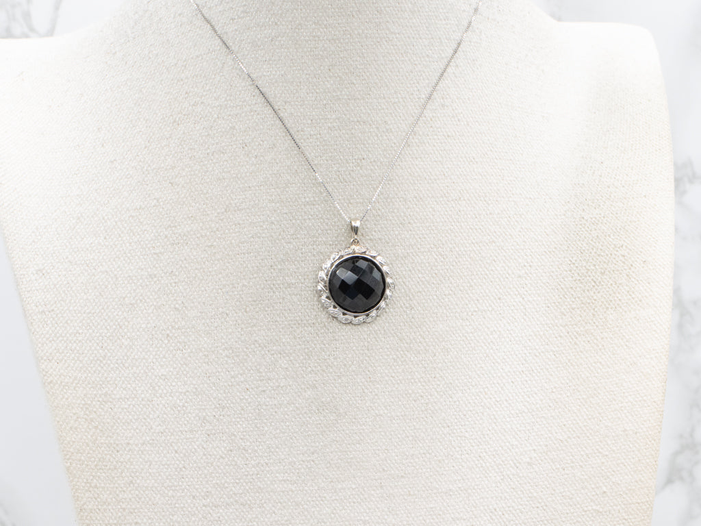 Faceted Obsidian and Botanical Diamond Halo Pendant