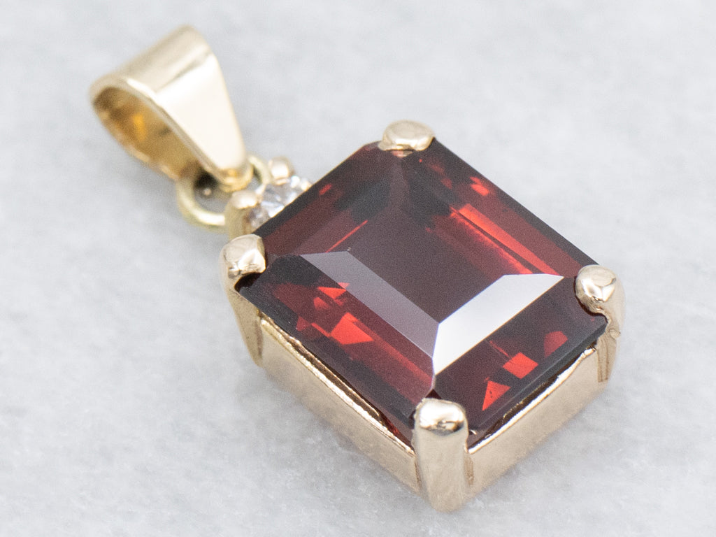 Garnet Yellow Gold Pendant with Diamond Accent