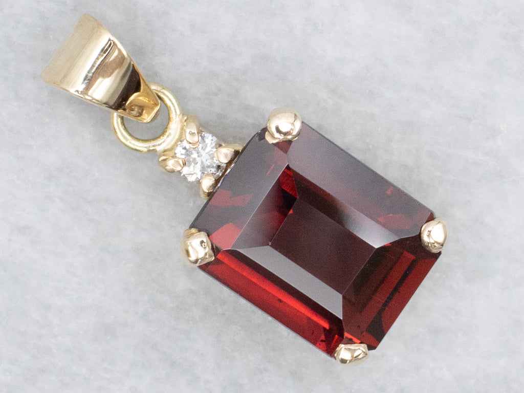 Garnet Yellow Gold Pendant with Diamond Accent