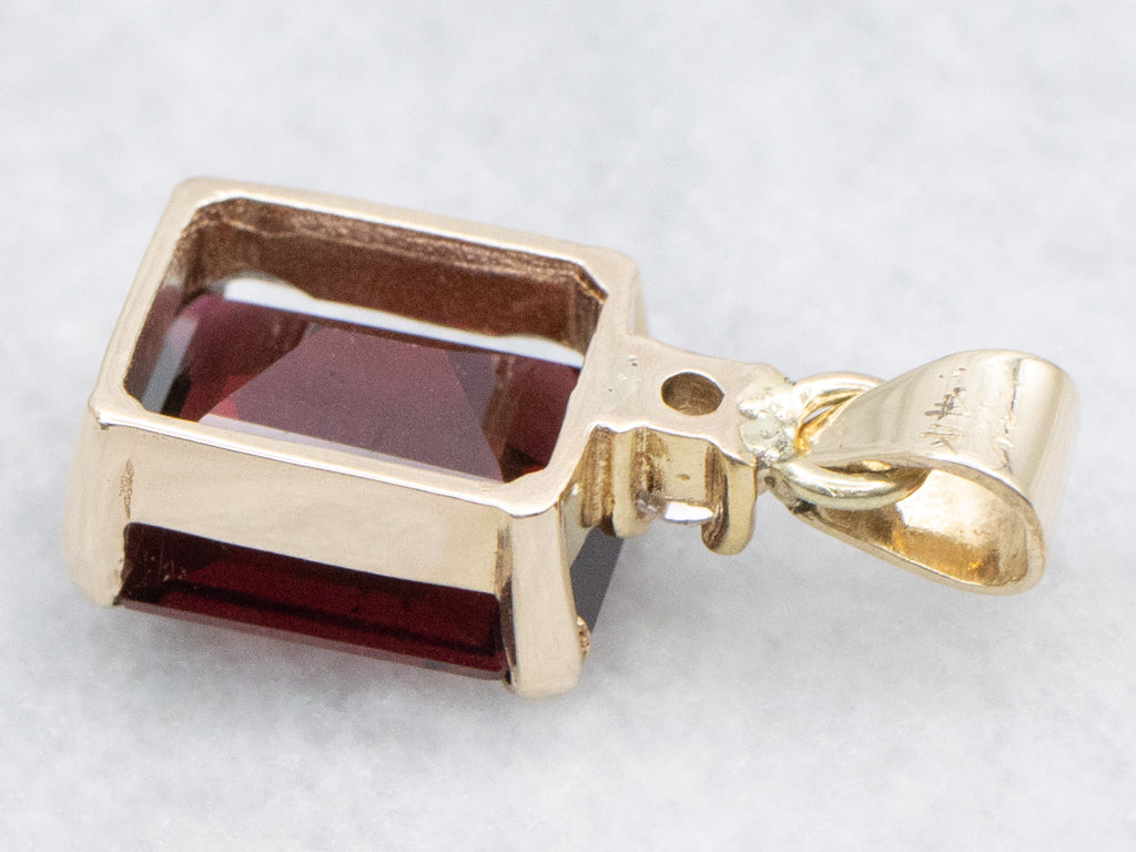 Garnet Yellow Gold Pendant with Diamond Accent