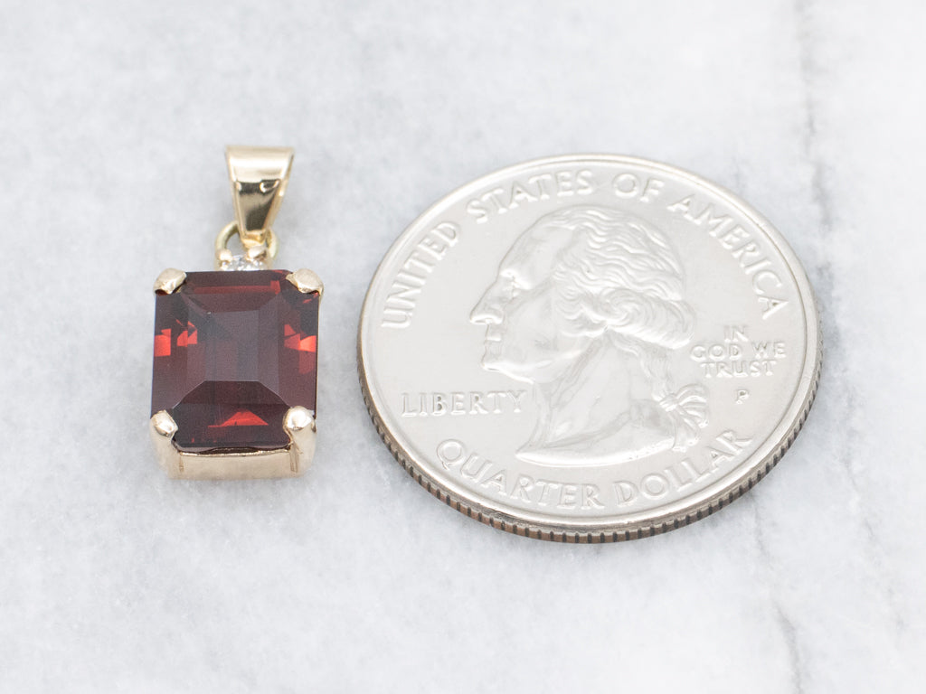 Garnet Yellow Gold Pendant with Diamond Accent