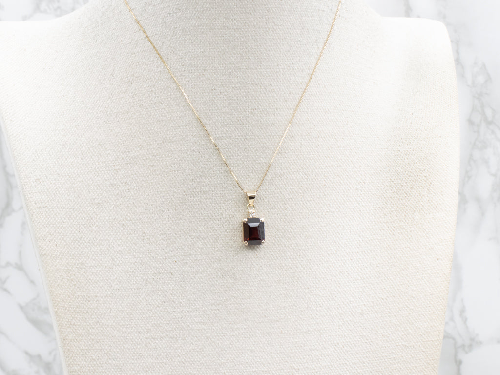 Garnet Yellow Gold Pendant with Diamond Accent