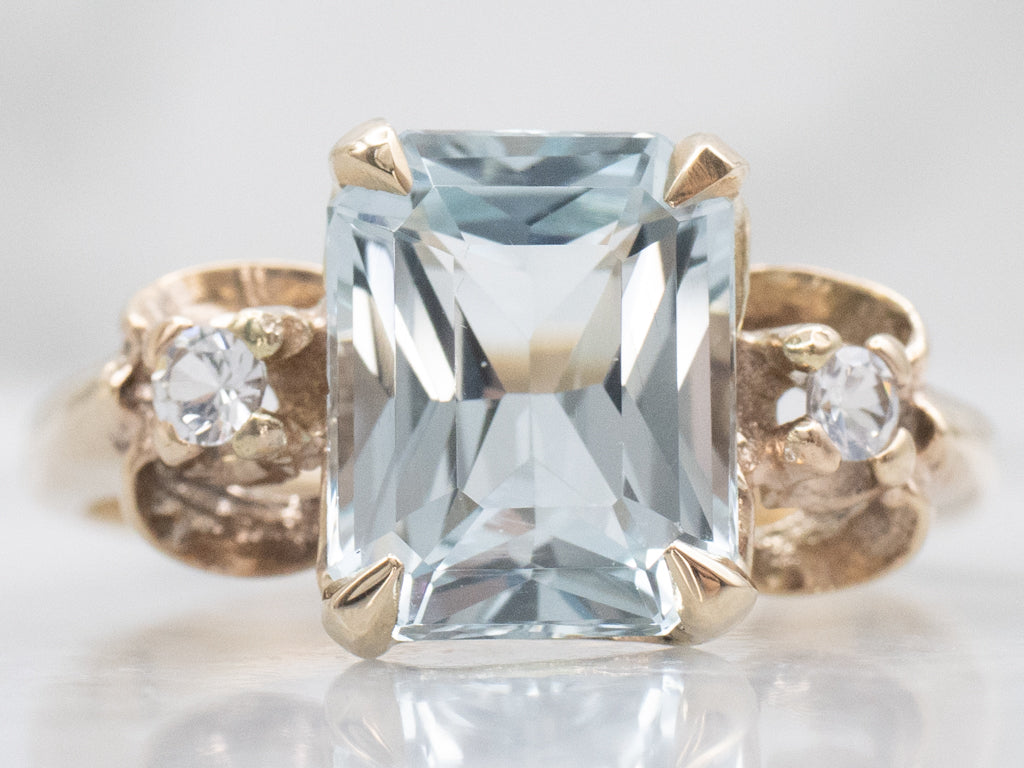 Blue Topaz Yellow Gold Ring with Spinel Accents