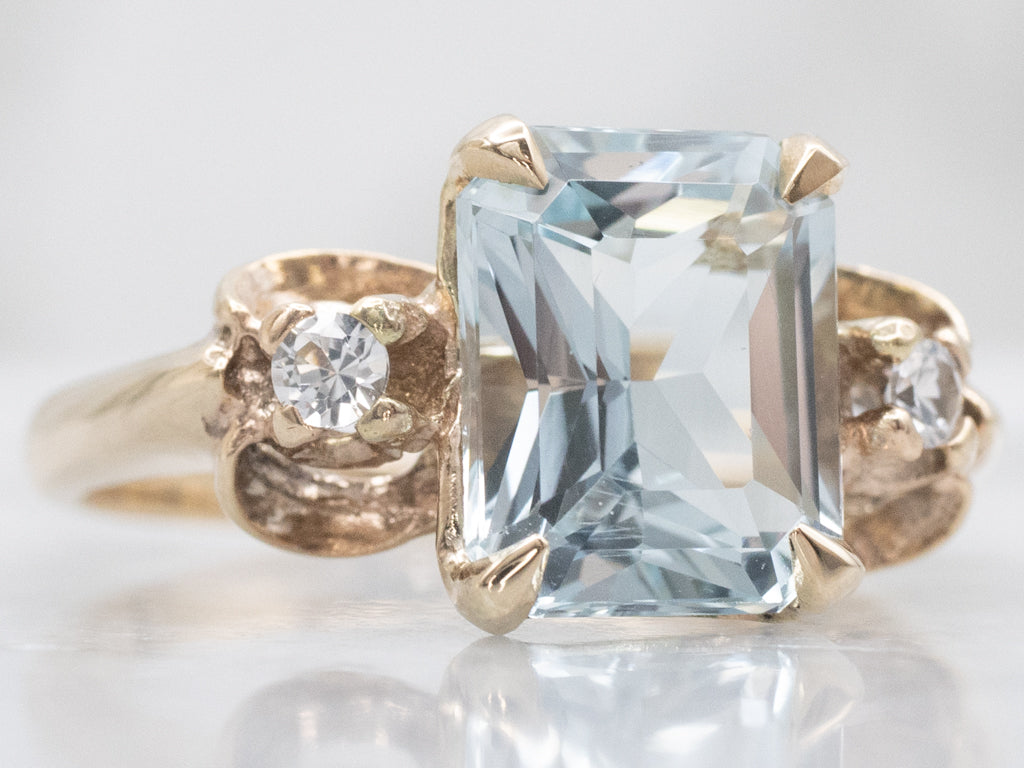 Blue Topaz Yellow Gold Ring with Spinel Accents