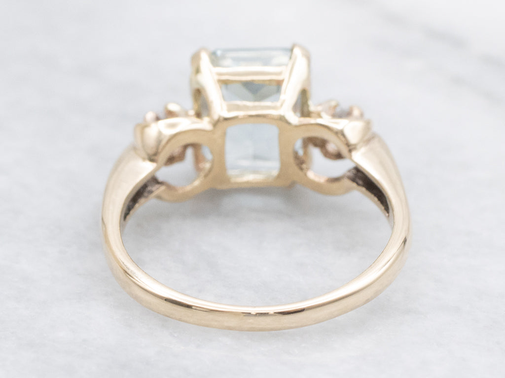 Blue Topaz Yellow Gold Ring with Spinel Accents