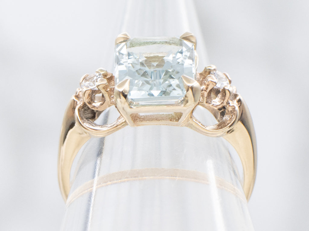 Blue Topaz Yellow Gold Ring with Spinel Accents