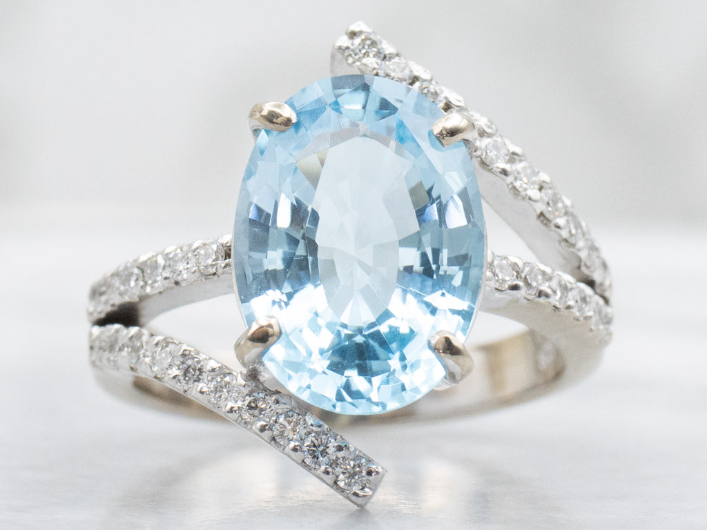 Modern White Gold Blue Topaz and Diamond Bypass Ring