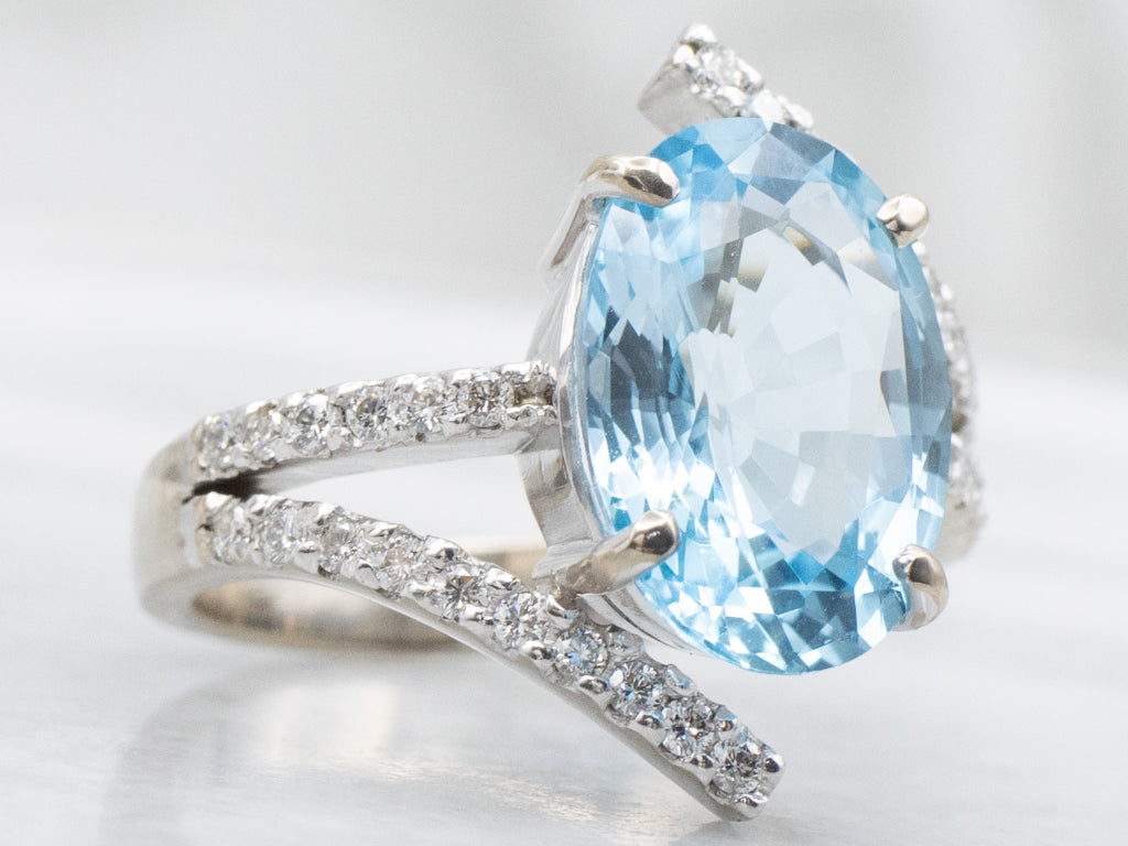 Modern White Gold Blue Topaz and Diamond Bypass Ring