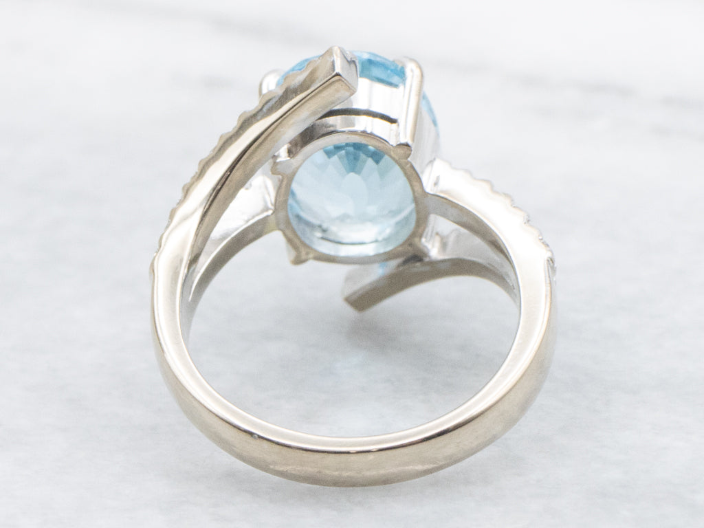 Modern White Gold Blue Topaz and Diamond Bypass Ring