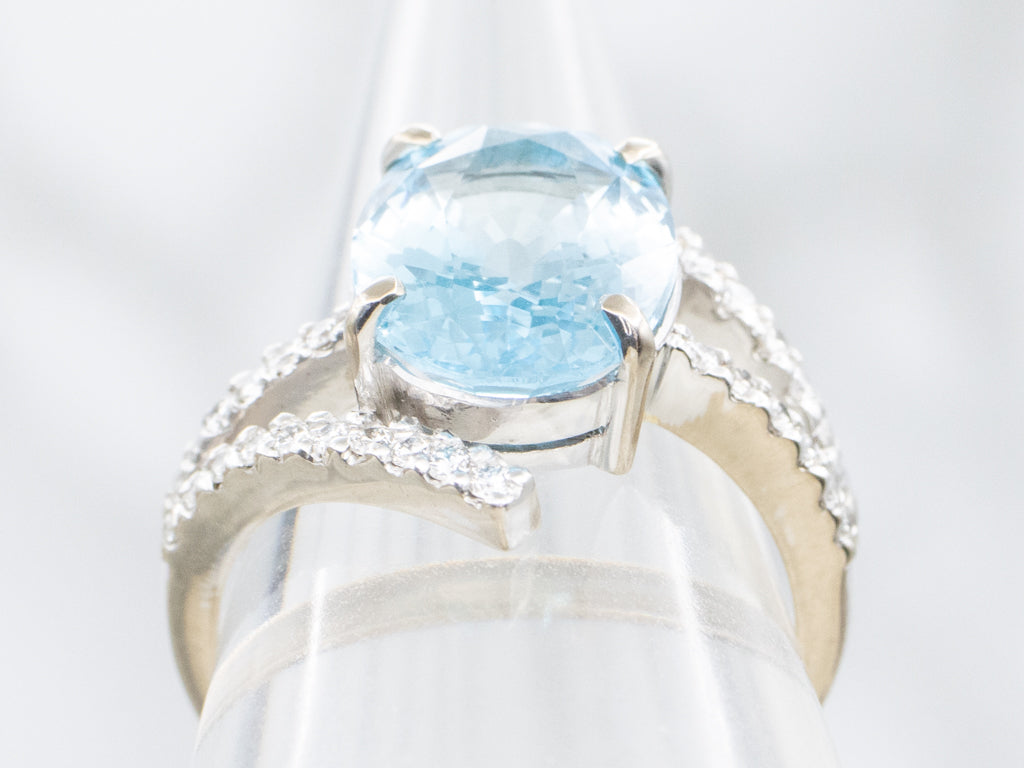 Modern White Gold Blue Topaz and Diamond Bypass Ring