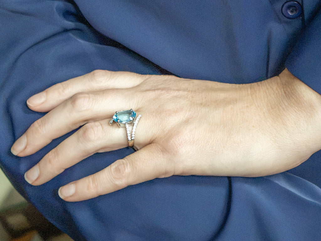 Modern White Gold Blue Topaz and Diamond Bypass Ring