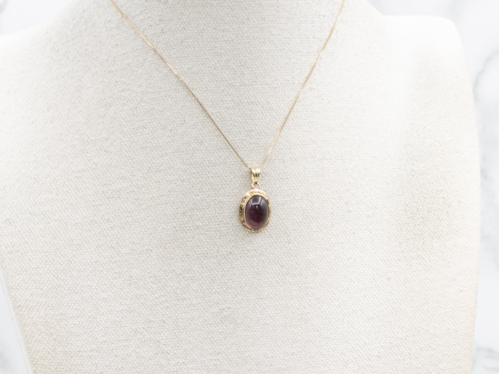 Vintage Gold Bezel-Set Purple Glass Cabochon Pendant
