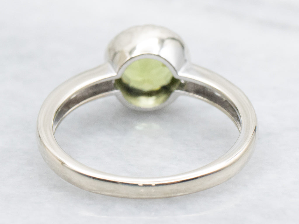 Bezel-Set Peridot White Gold Ring with Diamond Accents