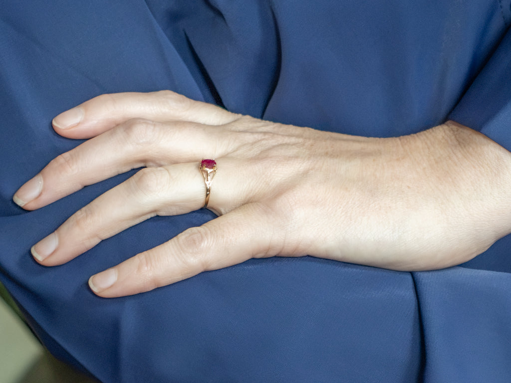 Oval-Cut Ruby Split Shank Gold Solitaire Ring