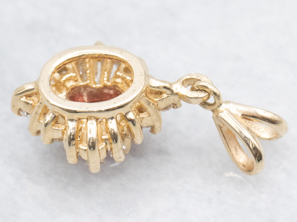 Yellow Gold Ruby and Diamond Halo Pendant