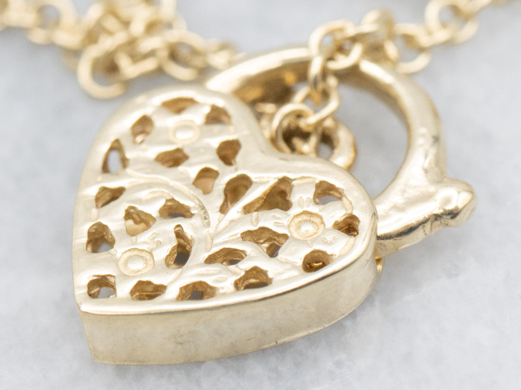 Yellow Gold Alternating Oval Link Bracelet with Floral Filigree Padlock Heart
