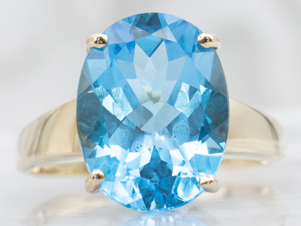 Oval-Cut Blue Topaz Yellow Gold Cocktail Ring