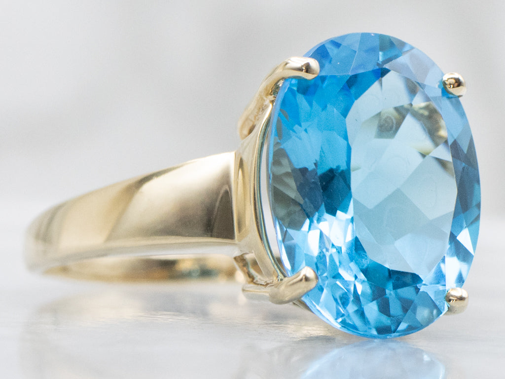 Oval-Cut Blue Topaz Yellow Gold Cocktail Ring