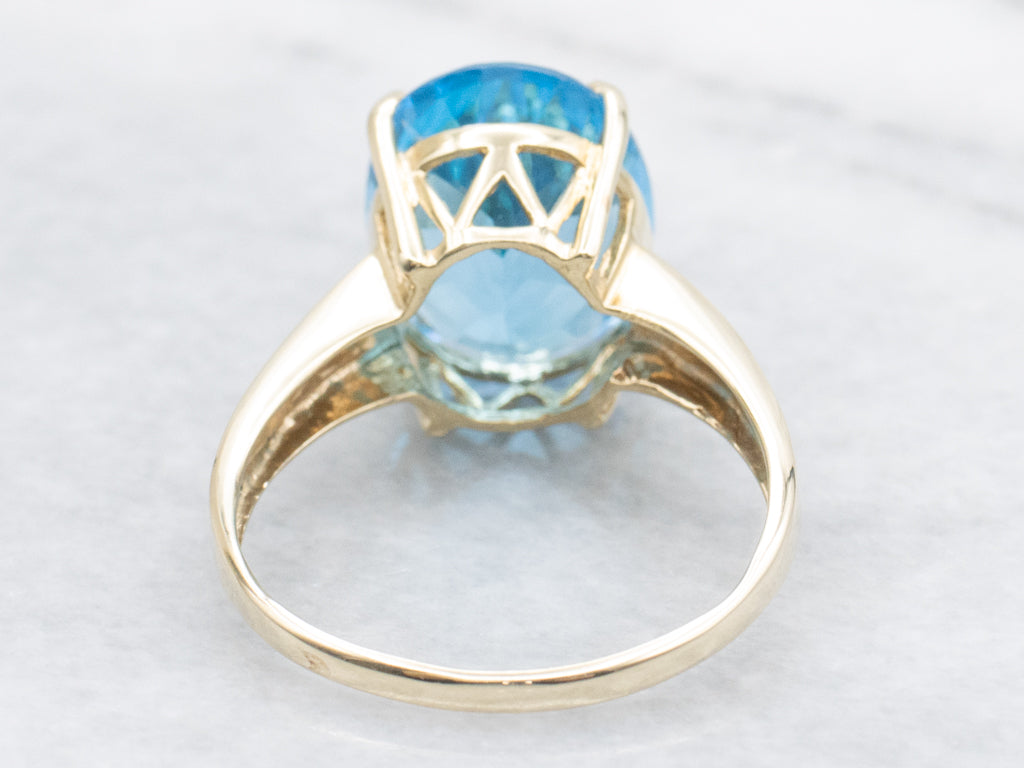 Oval-Cut Blue Topaz Yellow Gold Cocktail Ring