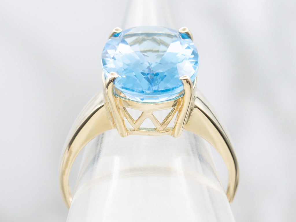 Oval-Cut Blue Topaz Yellow Gold Cocktail Ring