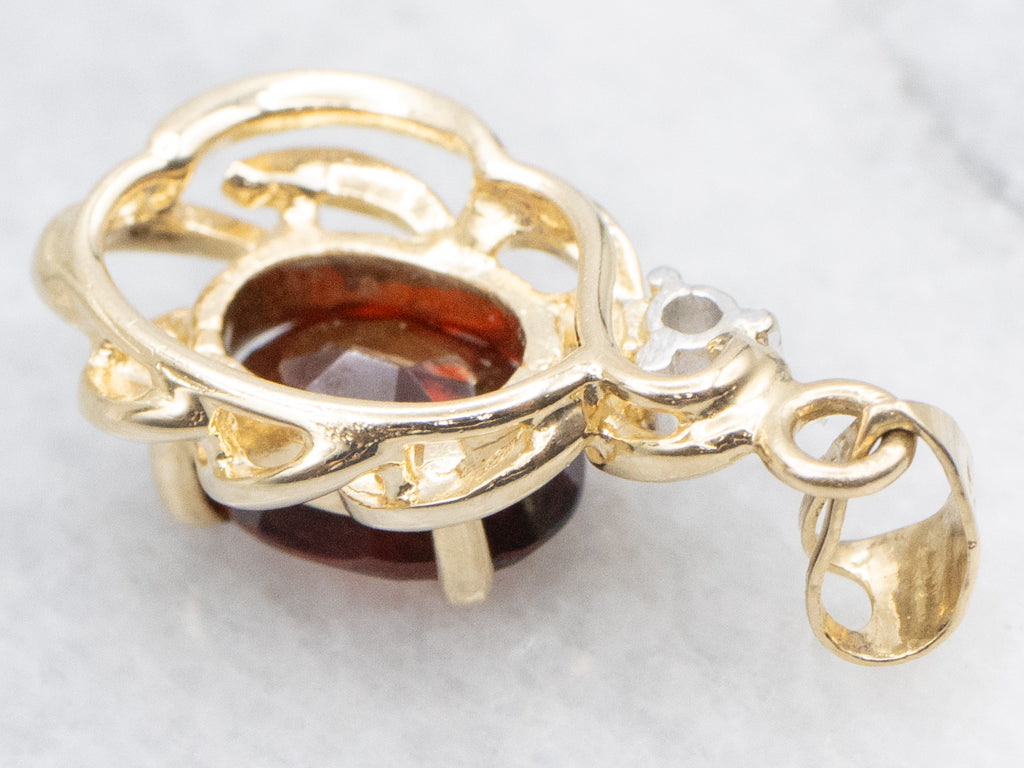 Looping Gold Garnet and Diamond Pendant