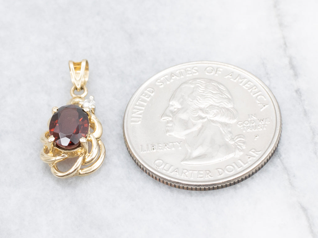 Looping Gold Garnet and Diamond Pendant