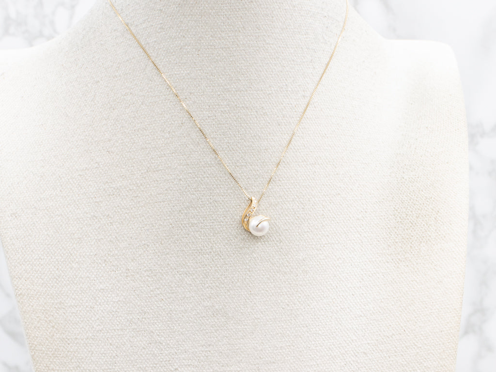 Button Pearl and Diamond Modern Twisting Gold Pendant