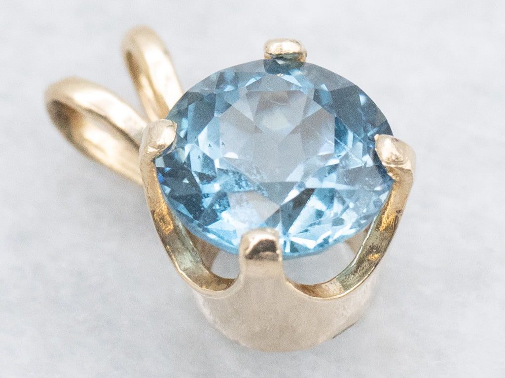 Blue Topaz and Gold Solitaire Gemstone Pendant