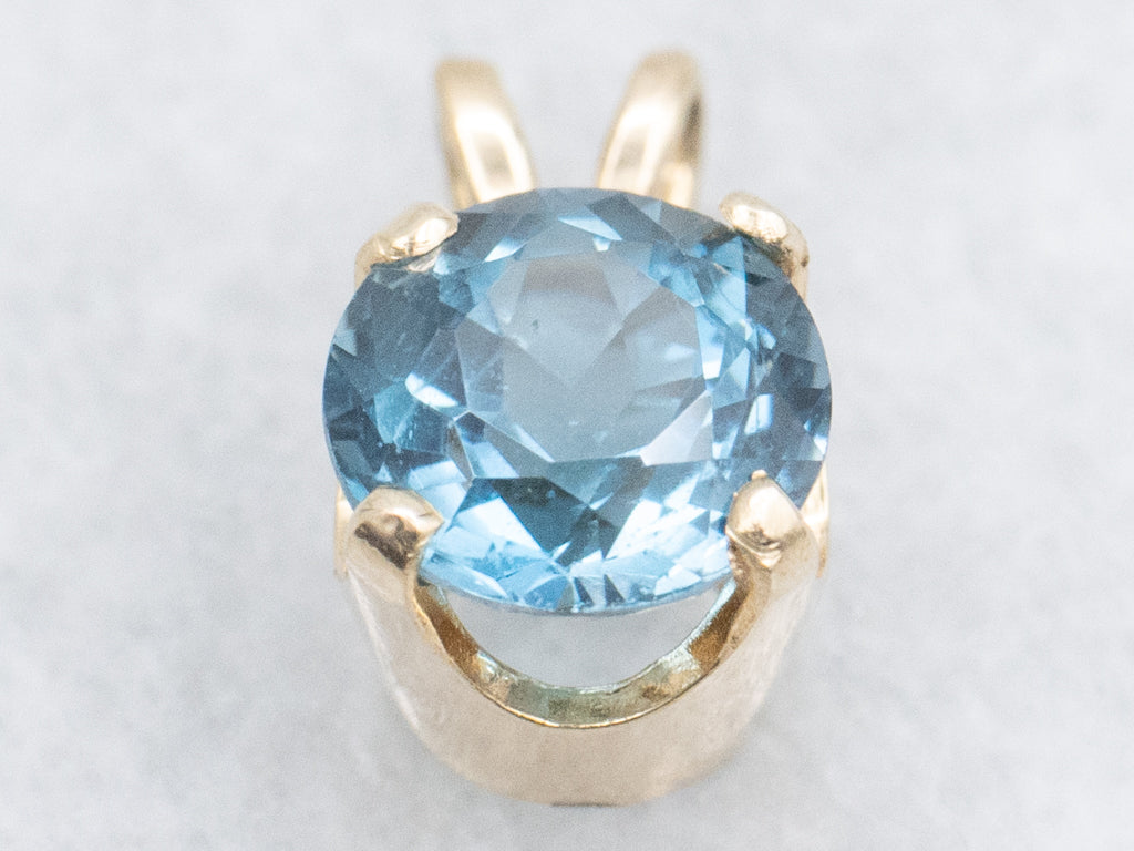 Blue Topaz and Gold Solitaire Gemstone Pendant