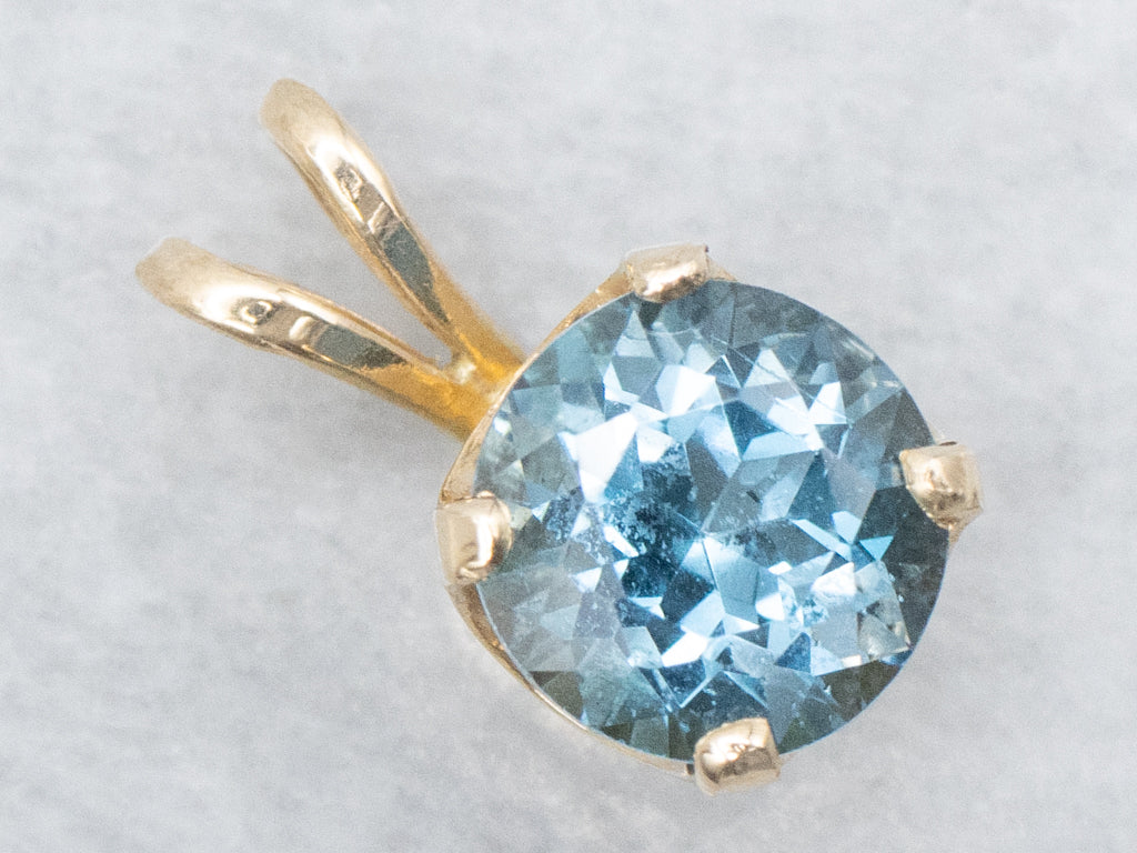 Blue Topaz and Gold Solitaire Gemstone Pendant