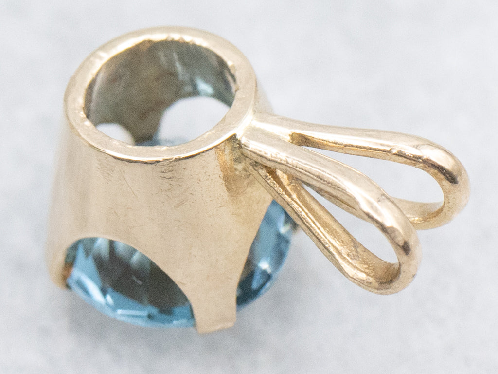 Blue Topaz and Gold Solitaire Gemstone Pendant