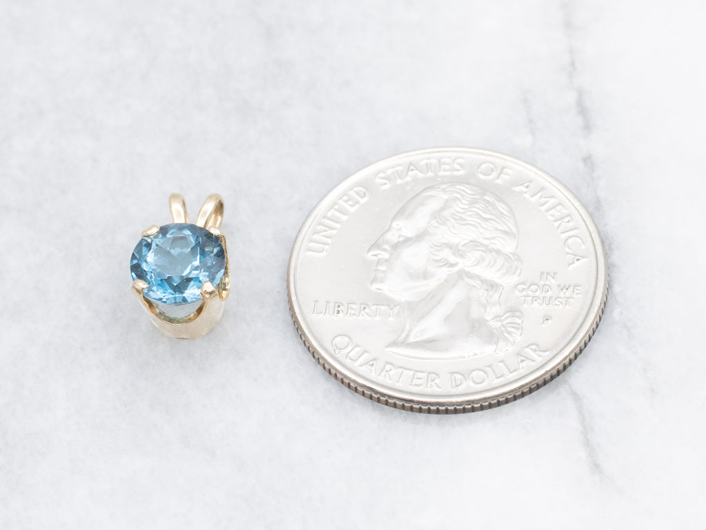 Blue Topaz and Gold Solitaire Gemstone Pendant