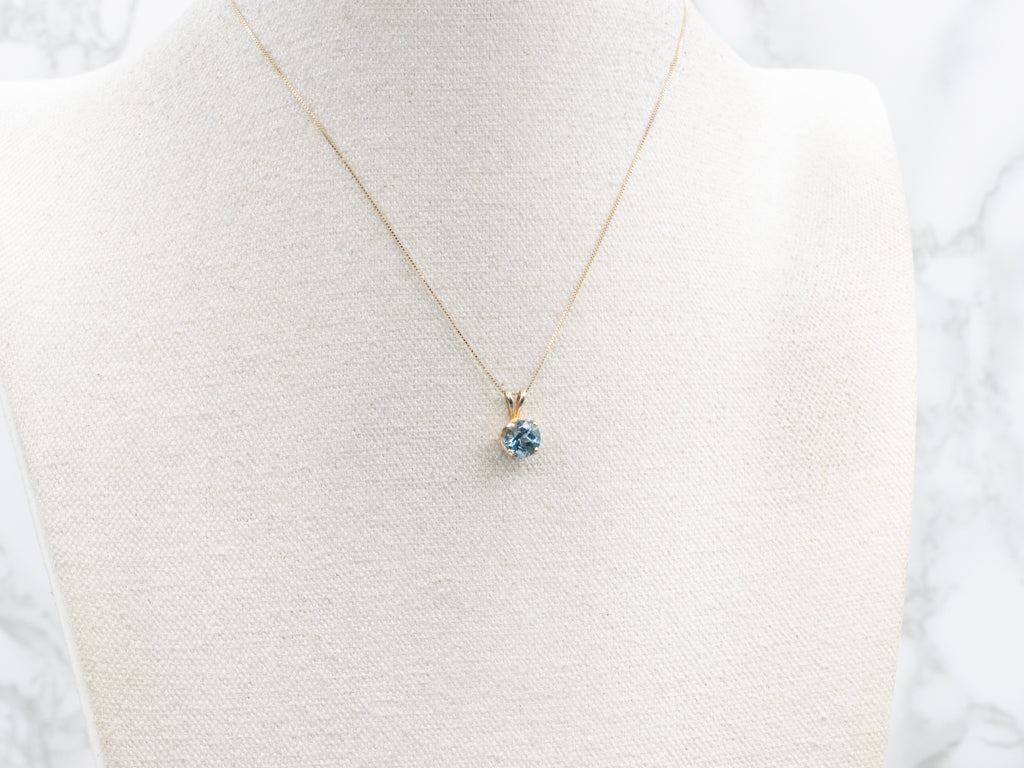 Blue Topaz and Gold Solitaire Gemstone Pendant