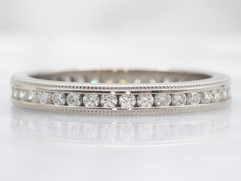 Channel-Set Diamond White Gold Eternity Band with Milgrain Edge