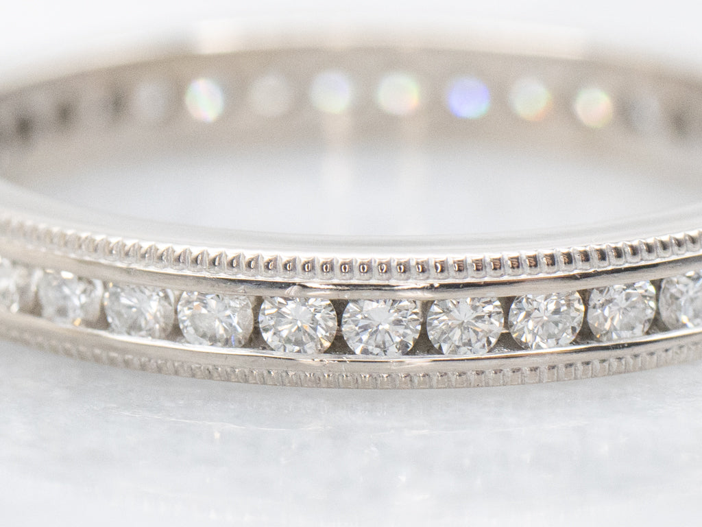 Channel-Set Diamond White Gold Eternity Band with Milgrain Edge