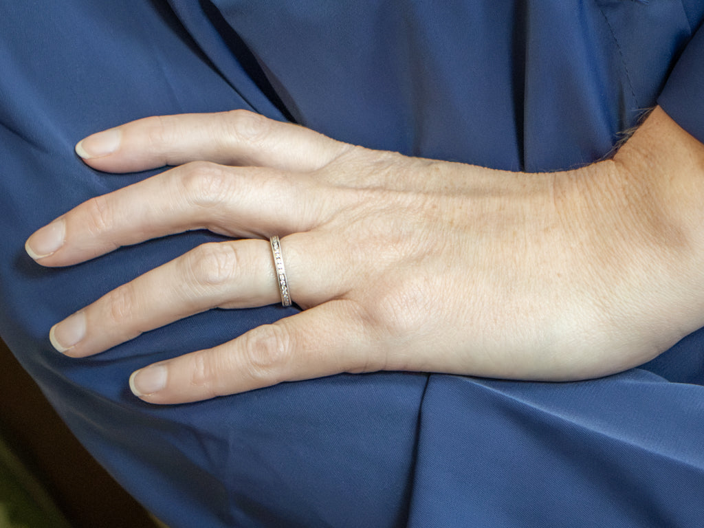 Channel-Set Diamond White Gold Eternity Band with Milgrain Edge