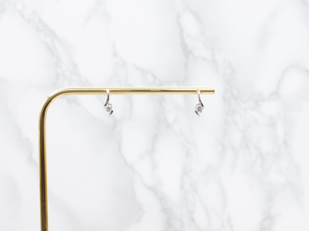 Modern White Gold Twisted Diamond Stud Earrings