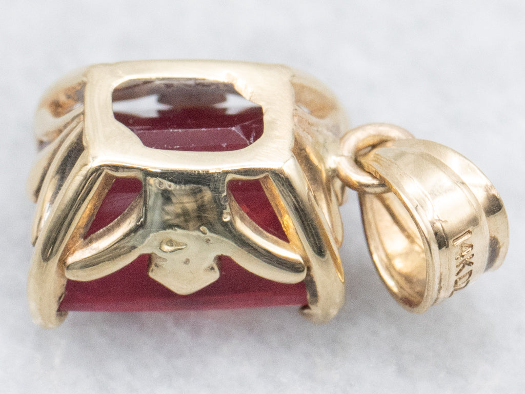 Glass-Filled Ruby Yellow Gold Pendant