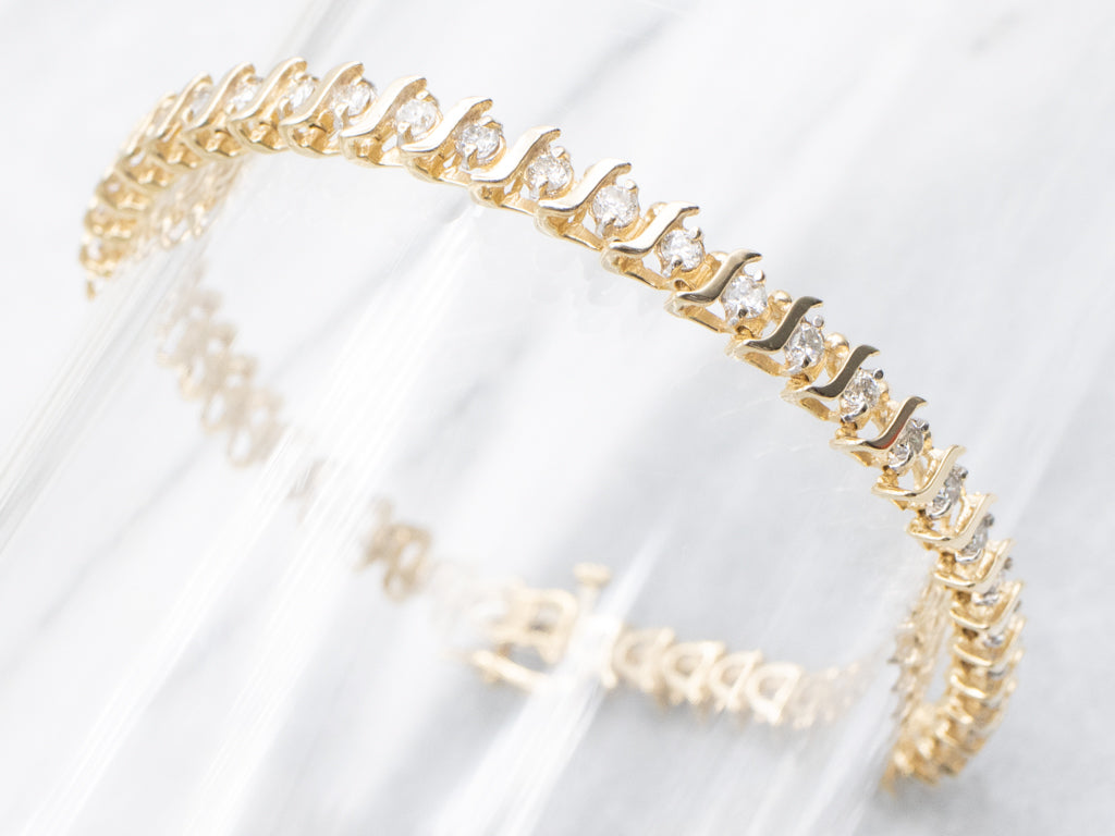 Gold Curved-Bar Link Diamond Tennis Bracelet
