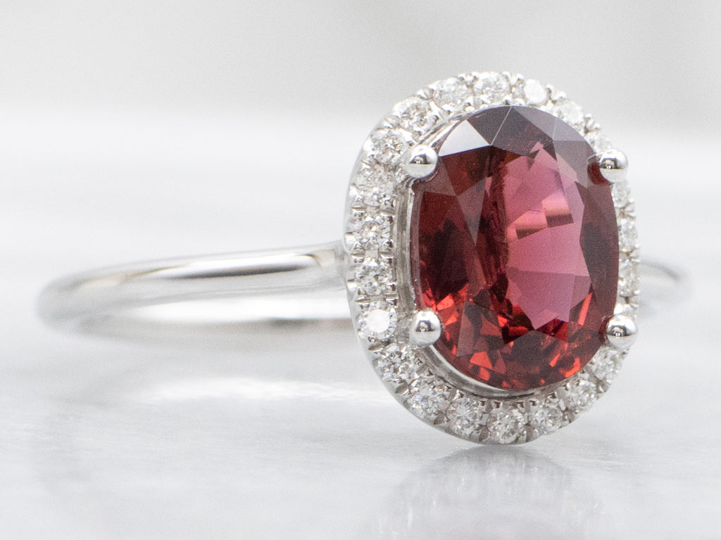Modern Gold Red Spinel and Diamond Halo Ring