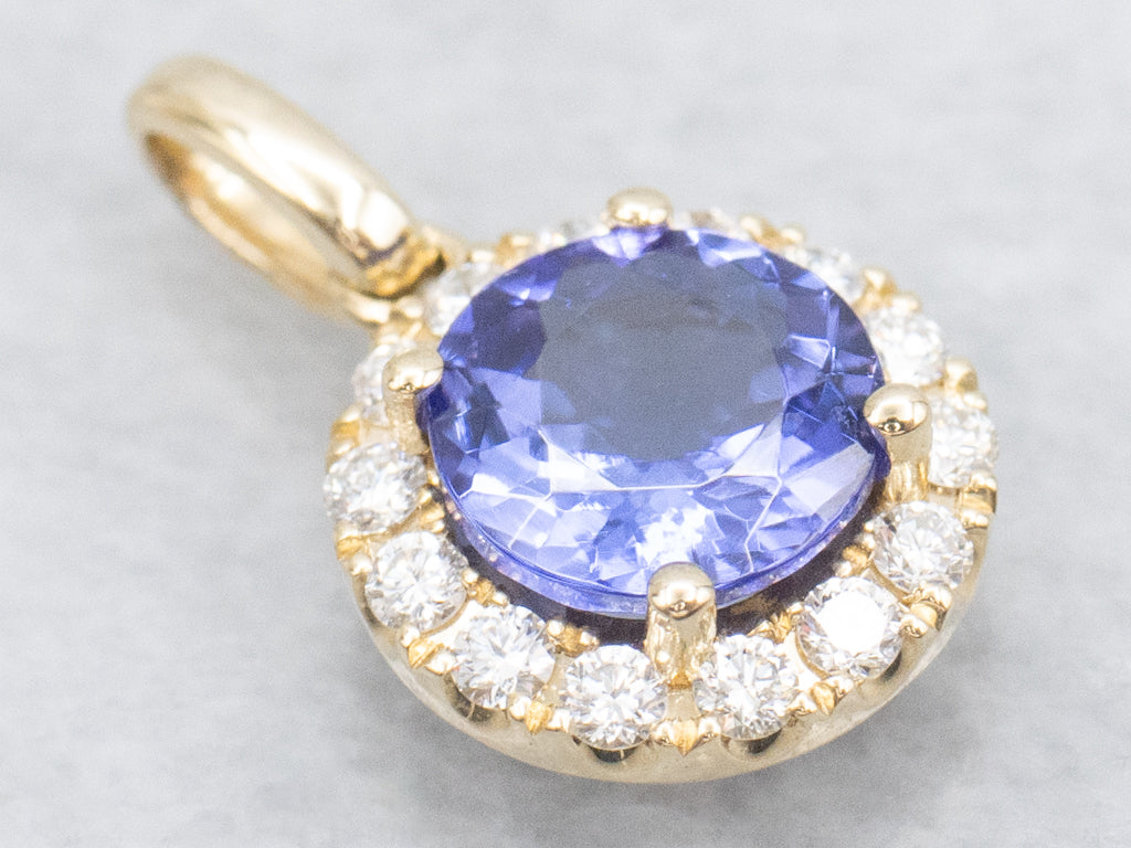 Modern Tanzanite and Diamond Halo Gold Pendant